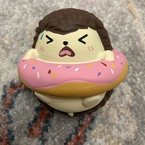 Cutie creative fluff fluff hedgehog in a donut